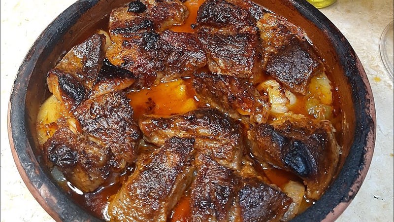 طاجن بطاطس باللحمة